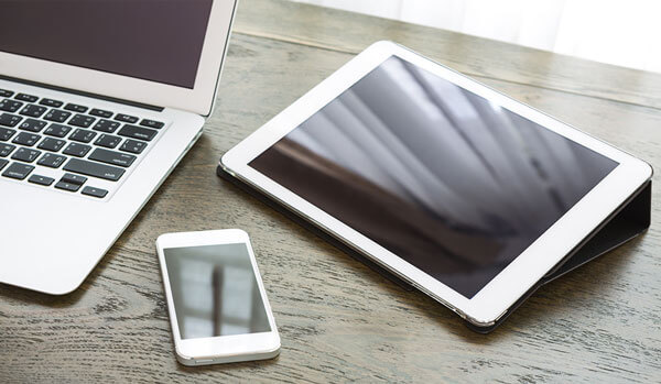 close-up-technological-devices-wooden-desk Image of laptop, ipad and mobile phone on desktop