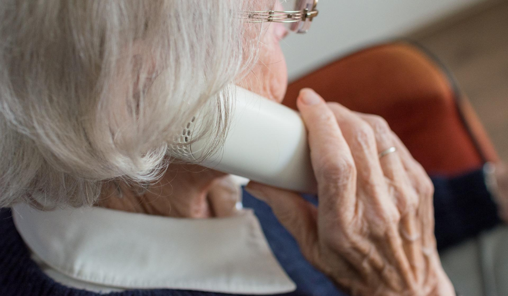 elderly person on the phone